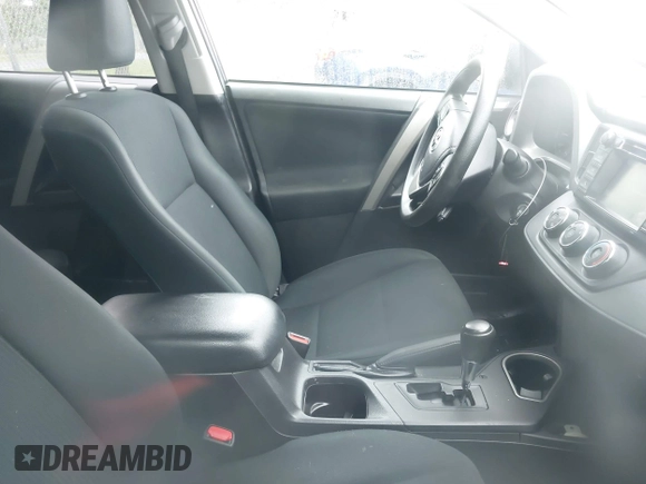 2018 Toyota RAV4 LE with VIN 2T3BFREV9JW857284, listed as a IAAI auction lot 42448480 with 85,551 mi miles and . Bid and sale history available at DreamBid. Image 5.