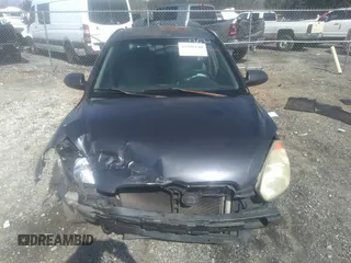 2006 Hyundai Accent GLS z VIN KMHCN46C66U027692, wystawiony jako IAAI lot #41796140 z przebiegiem 233 488 mil mil oraz . Historia ofert i sprzedaży dostępna na DreamBid. Obrazek 12.