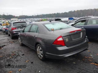 2011 Ford Fusion SE with VIN 3FAHP0HG4BR229273, listed as a IAAI auction lot 40851336 with 153,960 mi miles. Bid and sale history available at carsss.com. Image 3.