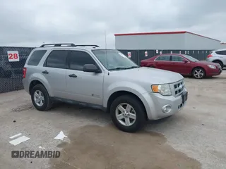 2009 Ford Escape Hybrid z VIN 1FMCU49389KD10786, wystawiony jako IAAI lot #42134866 z przebiegiem 112 696 mil mil oraz . Historia ofert i sprzedaży dostępna na DreamBid. Obrazek 1.