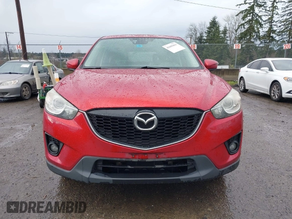 2015 Mazda CX-5 Grand Touring with VIN JM3KE4DY0F0479392, listed as a IAAI auction lot 41659415 with 141,403 mi miles. Bid and sale history available at carsss.com. Image 12.