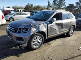 2012 Volkswagen Touareg Lux z VIN WVGEK9BPXCD011322, wystawiony jako Copart lot #87062254 z przebiegiem 110 985 mil mil oraz Szkoda całkowita • Salvage title. Historia ofert i sprzedaży dostępna na DreamBid. Obrazek 1.