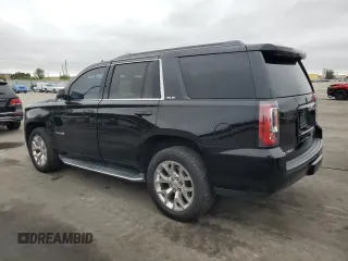 2015 GMC Yukon SLE with VIN 1GKS1AKC0FR684558, listed as a Copart auction lot 42162985 with 156,302 mi miles and Clean Title. Bid and sale history available at carsss.com. Image 2.