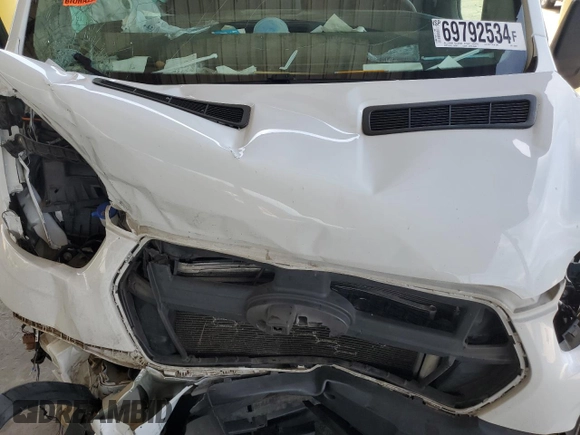 2021 Ford Transit Cargo with VIN 1FTBR1C85MKA88804, listed as a Copart auction lot 69792534 with Not Provided miles and Salvage Title. Bid and sale history available at DreamBid. Image 12.