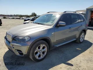 2011 BMW X5 35d with VIN 5UXZW0C53BL371571, listed as a Copart auction lot 65283985 with 166,253 mi miles and Clean title. Bid and sale history available at DreamBid. Image 1.