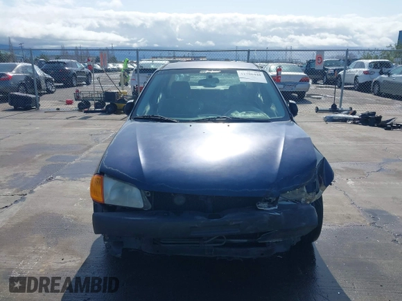 1999 Mazda Protege DX z VIN JM1BJ2229X0189290, wystawiony jako IAAI lot #41796448 z przebiegiem 281 528 mil mil oraz . Historia ofert i sprzedaży dostępna na DreamBid. Obrazek 13.