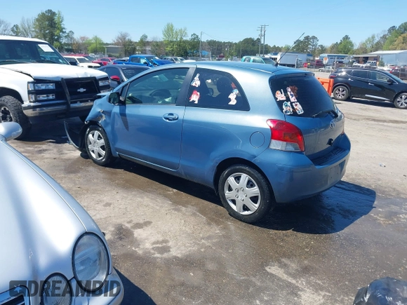 2010 Toyota Yaris with VIN JTDJT4K36A5285298, listed as a IAAI auction lot 42003609 with 158,418 mi miles. Bid and sale history available at carsss.com. Image 3.