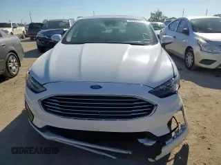2019 Ford Fusion Hybrid SE with VIN 3FA6P0LU9KR139329, listed as a Copart auction lot 36225173 with 66,274 mi miles. Bid and sale history available at carsss.com. Image 11.