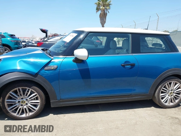2023 MINI Hardtop Cooper SE with VIN WMW13DJ07P2S73739, listed as a IAAI auction lot 42542088 with 16,344 mi miles and . Bid and sale history available at DreamBid. Image 14.