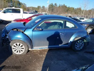 2019 Volkswagen Beetle S with VIN 3VWFD7AT5KM708953, listed as a IAAI auction lot 41440200 with 54,430 mi miles. Bid and sale history available at carsss.com. Image 15.
