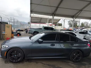2019 BMW 3 Series 330i with VIN WBA5R1C56KAK07317, listed as a IAAI auction lot 42034264 with 43,448 mi miles and . Bid and sale history available at DreamBid. Image 14.