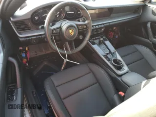 2021 Porsche 911 Carrera with VIN WP0AA2A97MS206873, listed as a Copart auction lot 77359214 with 1,036 mi miles and Salvage Title. Bid and sale history available at carsss.com. Image 8.