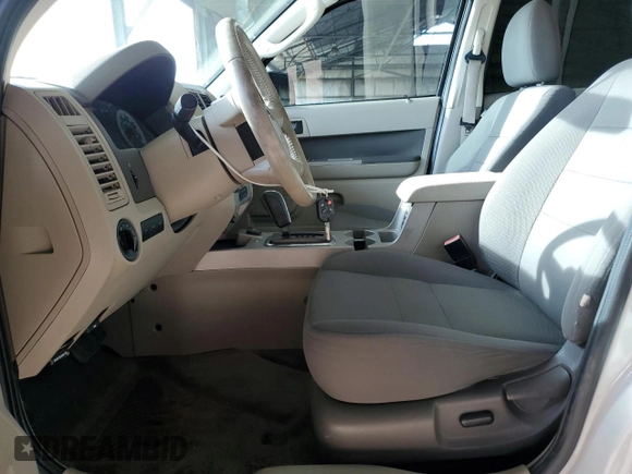 2009 Ford Escape Hybrid z VIN 1FMCU49389KB29641, wystawiony jako Copart lot #51164235 z przebiegiem 131 596 mil mil oraz Szkoda całkowita • Salvage title. Historia ofert i sprzedaży dostępna na DreamBid. Obrazek 7.