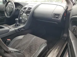 2015 Aston Martin Vantage z VIN SCFEBBAL2FGC18949, wystawiony jako Copart lot #54389965 z przebiegiem Nie podano mil oraz Szkody całkowita. Historia ofert i sprzedaży dostępna na DreamBid. Obrazek 10.