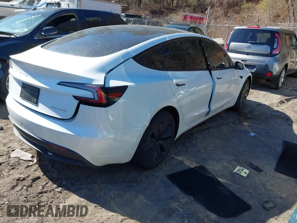 2025 Tesla Model 3 Long Range with VIN 5YJ3E1EB4SF914979, listed as a IAAI auction lot 41695023 with 2,263 mi miles and . Bid and sale history available at DreamBid. Image 4.