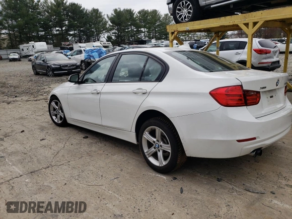2013 BMW 3 Series 328i xDrive with VIN WBA3B5G59DNS04579, listed as a Copart auction lot 50445404 with 115,404 mi miles and Salvage title. Bid and sale history available at DreamBid. Image 2.