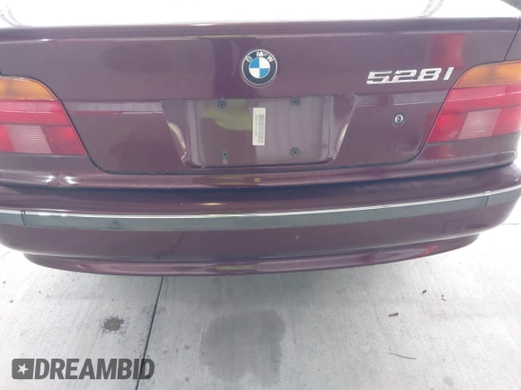 1997 BMW 5 Series 528iA with VIN WBADD6323VBW15656, listed as a IAAI auction lot 41777667 with 142,443 mi miles. Bid and sale history available at carsss.com. Image 13.