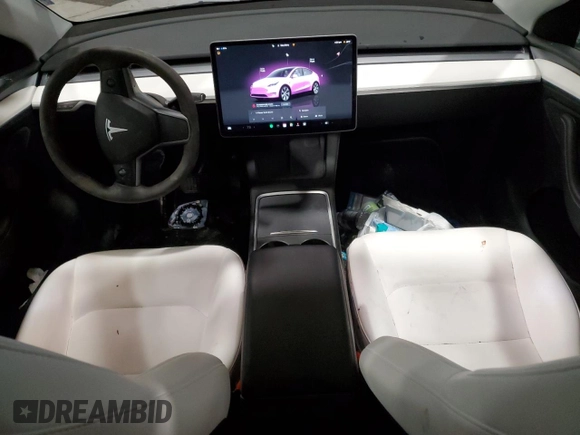 2024 Tesla Model Y Long Range with VIN 7SAYGDEE5RA237687, listed as a Copart auction lot 48366825 with 24,650 mi miles and Salvage Title. Bid and sale history available at DreamBid. Image 8.