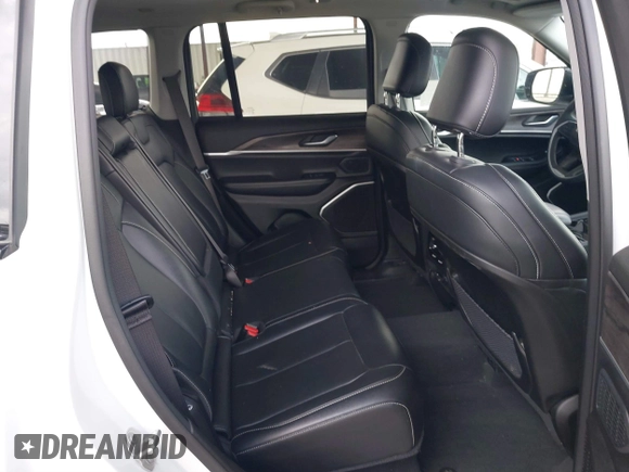 2023 Jeep Grand Cherokee with VIN 1C4RJYB60PC650900, listed as a IAAI auction lot 41773825 with 19,243 mi miles and . Bid and sale history available at DreamBid. Image 8.