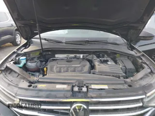 2023 Volkswagen Tiguan S z VIN 3VVRB7AX7PM036833, wystawiony jako IAAI lot #41827631 z przebiegiem 43 383 mil mil oraz . Historia ofert i sprzedaży dostępna na DreamBid. Obrazek 10.