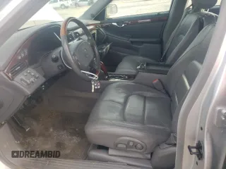 2003 Cadillac DeVille DTS z VIN 1G6KF57973U163124, wystawiony jako Copart lot #78054584 z przebiegiem 111 189 mil mil oraz Szkoda całkowita • Salvage title. Historia ofert i sprzedaży dostępna na DreamBid. Obrazek 7.