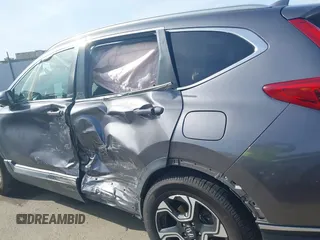 2018 Honda CR-V Touring with VIN 7FARW1H93JE027294, listed as a IAAI auction lot 41903484 with 80,999 mi miles and . Bid and sale history available at DreamBid. Image 19.