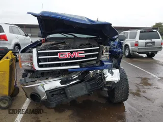 2013 GMC Sierra 1500 SLE with VIN 1GTR2VE70DZ261943, listed as a IAAI auction lot 41767646 with 318,185 mi miles and . Bid and sale history available at DreamBid. Image 13.