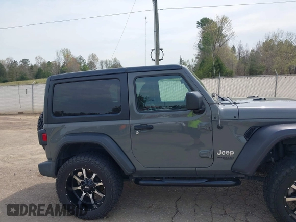 2021 Jeep Wrangler Sport z VIN 1C4GJXAN3MW550665, wystawiony jako IAAI lot #41902279 z przebiegiem 32 250 mil mil oraz . Historia ofert i sprzedaży dostępna na DreamBid. Obrazek 13.