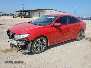 2016 Honda Civic EX-T z VIN 2HGFC1F38GH647844, wystawiony jako Copart lot #57120305 z przebiegiem 136 629 mil mil oraz Szkoda całkowita • Salvage title. Historia ofert i sprzedaży dostępna na DreamBid. Obrazek 1.