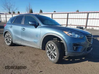 2016 Mazda CX-5 Grand Touring with VIN JM3KE4DY6G0860150, listed as a IAAI auction lot 41731312 with 95,885 mi miles and . Bid and sale history available at carsss.com. Image 1.