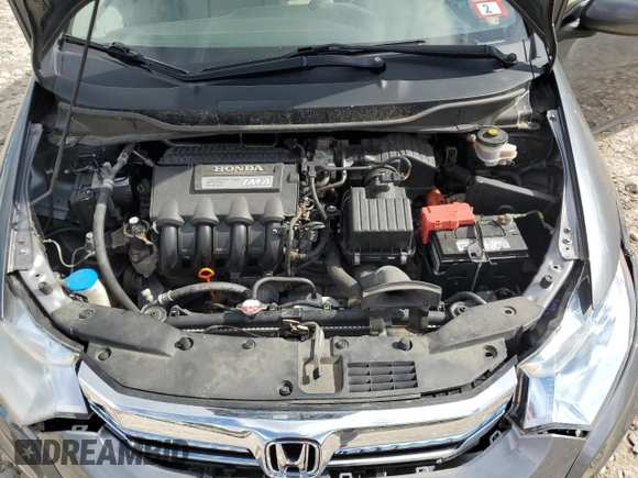 2013 Honda Insight with VIN JHMZE2H36DS002735, listed as a Copart auction lot 73602064 with 112,967 mi miles and Salvage title. Bid and sale history available at DreamBid. Image 11.