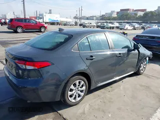 2023 Toyota Corolla LE with VIN 5YFB4MDE5PP014910, listed as a IAAI auction lot 41860905 with 40,517 mi miles. Bid and sale history available at carsss.com. Image 4.