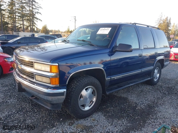 1997 Chevrolet Tahoe with VIN 1GNEK13R4VJ418974, listed as a IAAI auction lot 41560411 with 198,170 mi miles. Bid and sale history available at carsss.com. Image 2.