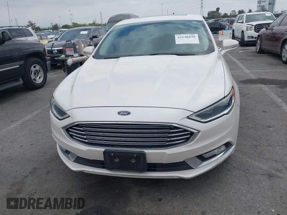 2017 Ford Fusion SE with VIN 3FA6P0HD0HR180188, listed as a IAAI auction lot 42146020 with 100,901 mi miles and . Bid and sale history available at DreamBid. Image 12.