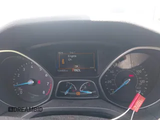 2017 Ford Focus SE with VIN 1FADP3F21HL217838, listed as a IAAI auction lot 42560331 with 154,406 mi miles and . Bid and sale history available at DreamBid. Image 7.