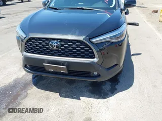 2023 Toyota Corolla Cross XLE z VIN 7MUDAAAG3PV069634, wystawiony jako IAAI lot #42489692 z przebiegiem 18 923 mil mil oraz . Historia ofert i sprzedaży dostępna na DreamBid. Obrazek 13.