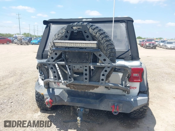 2018 Jeep Wrangler Sport with VIN 1C4GJXAN8JW302519, listed as a IAAI auction lot 42331871 with 51,639 mi miles and . Bid and sale history available at DreamBid. Image 16.