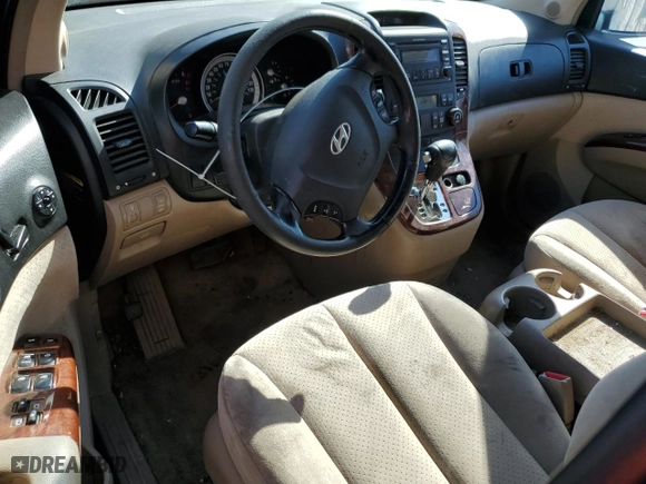 2007 Hyundai Entourage GLS with VIN KNDMC233876010972, listed as a Copart auction lot 77254694 with 172,656 mi miles and Clean Title. Bid and sale history available at carsss.com. Image 8.