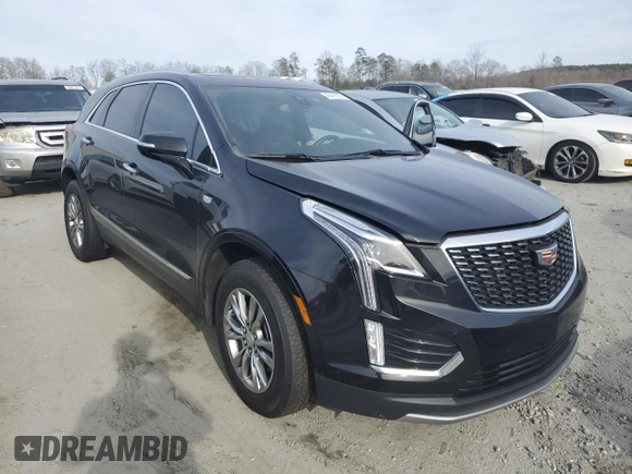 2023 Cadillac XT5 FWD Premium Luxury z VIN 1GYKNCRS6PZ145494, wystawiony jako Copart lot #45475375 z przebiegiem 48 339 mil mil oraz Szkoda całkowita • Salvage title. Historia ofert i sprzedaży dostępna na DreamBid. Obrazek 4.