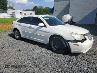 2010 Chrysler Sebring Limited with VIN 1C3CC5FD7AN133407, listed as a Copart auction lot 66102905 with 196,372 mi miles and Salvage title. Bid and sale history available at DreamBid. Image 4.
