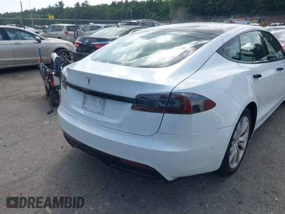 2021 Tesla Model S Long Range with VIN 5YJSA1E57MF428512, listed as a IAAI auction lot 42511020 with 29,611 mi miles and . Bid and sale history available at DreamBid. Image 16.