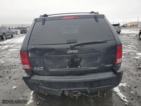 2010 Jeep Grand Cherokee Laredo with VIN 1J4RR4GT2AC107520, listed as a Copart auction lot 86554664 with 141,517 mi miles and Salvage Title. Bid and sale history available at carsss.com. Image 6.