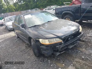 2002 Honda Accord SE z VIN 1HGCG66822A066895, wystawiony jako IAAI lot #42211932 z przebiegiem 231 540 mil mil oraz . Historia ofert i sprzedaży dostępna na DreamBid. Obrazek 1.
