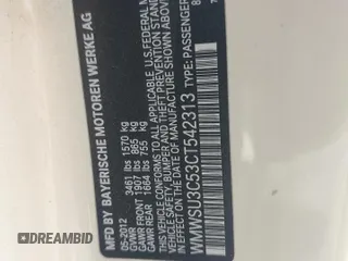 2012 MINI Hardtop with VIN WMWSU3C53CT542313, listed as a Copart auction lot 55098295 with 126,884 mi miles and Salvage Title. Bid and sale history available at DreamBid. Image 13.