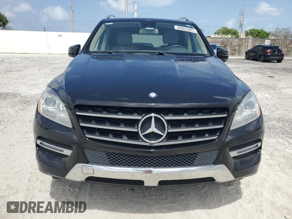 2013 Mercedes-Benz M 350 with VIN 4JGDA5JB1DA158693, listed as a Copart auction lot 60065005 with 98,896 mi miles and Salvage title. Bid and sale history available at DreamBid. Image 5.