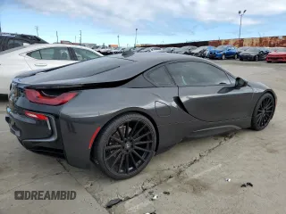 2016 BMW i8 z VIN WBY2Z2C5XGV674797, wystawiony jako Copart lot #44790384 z przebiegiem 58 006 mil mil oraz . Historia ofert i sprzedaży dostępna na DreamBid. Obrazek 3.