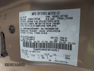 2005 Ford Focus S with VIN 1FAHP34N35W144951, listed as a IAAI auction lot 41880459 with 141,333 mi miles and . Bid and sale history available at carsss.com. Image 9.