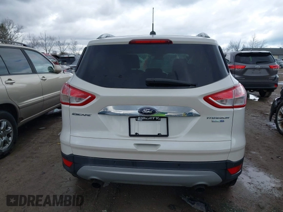 2016 Ford Escape Titanium with VIN 1FMCU9JX9GUA62674, listed as a IAAI auction lot 41838996 with 135,105 mi miles. Bid and sale history available at carsss.com. Image 17.