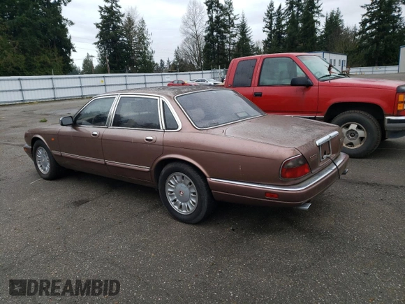 1995 Jaguar XJ with VIN SAJKX1742SC746763, listed as a Copart auction lot 84949964 with Not Provided miles and Clean Title. Bid and sale history available at DreamBid. Image 2.