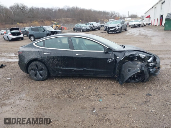 2018 Tesla Model 3 Long Range Battery with VIN 5YJ3E1EB1JF127289, listed as a IAAI auction lot 41484253 with 60,577 mi miles and . Bid and sale history available at DreamBid. Image 13.